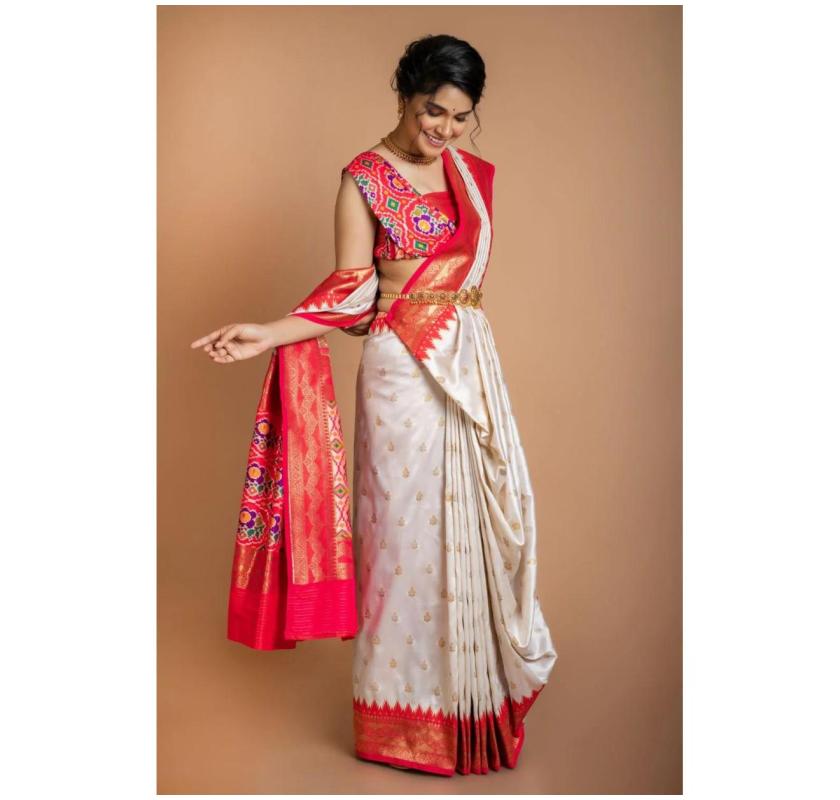 Traditional Red And White Saree Reflecting Cultural Heritage And Elegance